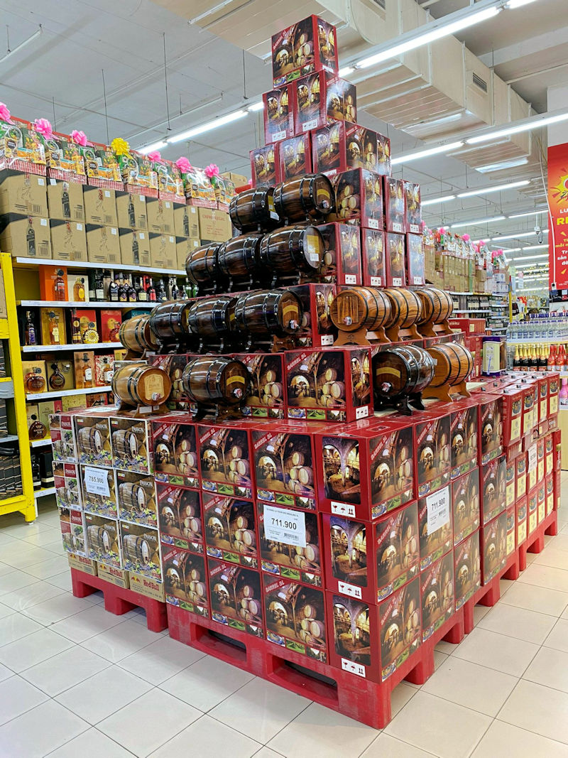 Retail display of barrel gift sets bottled by La Martiniquaise Vietnam
